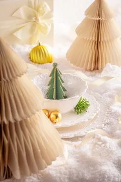 White Christmas dining table decorated with baubles. Stock Photos