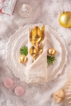 White Christmas table display with baubles and snow. Stock Photos