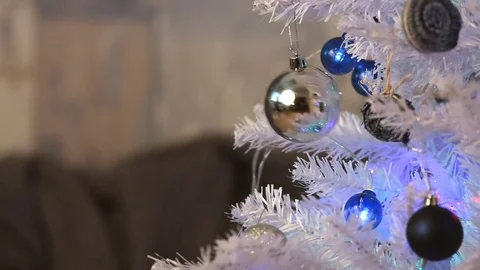 White christmas tree with silver decoration closeup studio shot Stock Footage 70450107