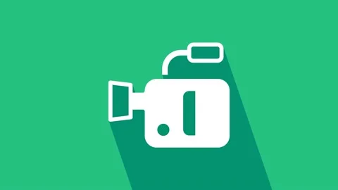 White Cinema camera icon isolated on green background. Video camera. Movie sign Stock Footage 225647886