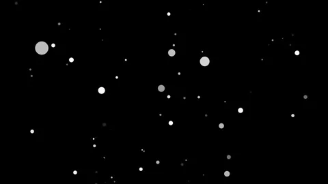 White circles of varying sizes float and move, creating a dynamic visual effect Stock-Footage 313554389