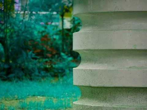 White circular shape wheel structure presented on green natural background. 스톡 사진