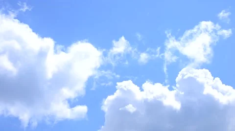 White cirrus and cumulus clouds move on background of blue sky Stock Footage 51058211