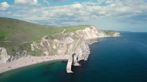 White Cliffs over Jurassic Coast and Durdle Door, Wareham, Dorset, England Stock Footage 201901104