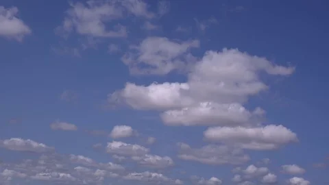 White clıouds on the blue sky, time lapse,wide angle lens  Stock Footage 77816089