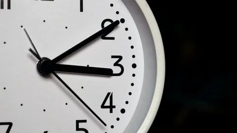 The White Clock With Black Arrows Shows The Time Three Hours Timelapse. Vídeos de archivo 120034350