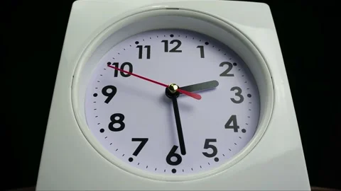 White clock on black background. Stock Footage 230114712