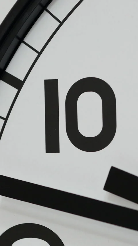 White Clock With Black Number Ten On Clock Face. Vertical. Stock-Footage 318726957