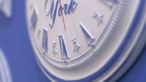 White clock face HD stock footage. Close up of a white clock face suggesting the Vídeo Stock 73889858