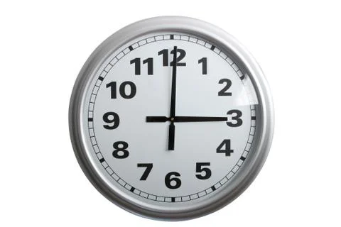 White clock showing 3 o'clock on white background Stock Photos