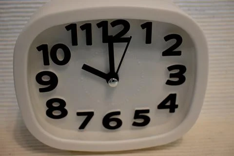 White clock showing ten oclock with copy space Photos