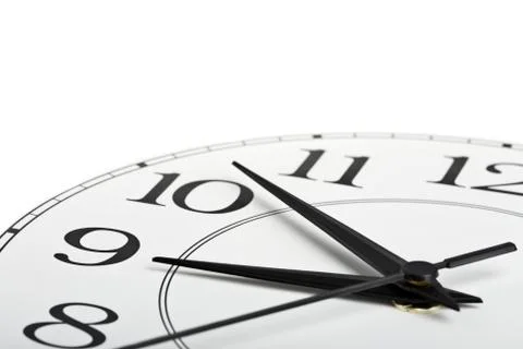 White clock showing time about nine isolated Stock Photos
