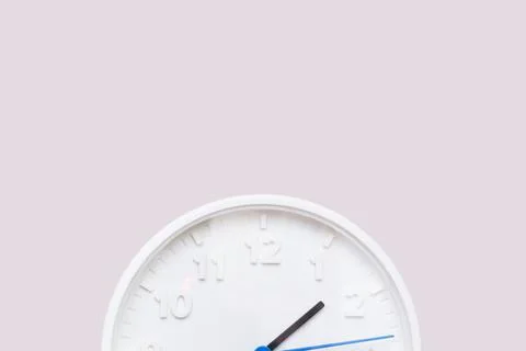 White clock on white wall background. quality photo Stock Photos