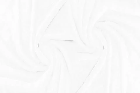 White cloth texture with soft waves. crumpled fabric background. Stock Photos