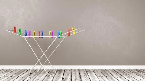 White Clothes Drying Rack with Colorful Clothespins on Wooden Stock Illustration