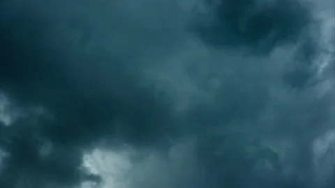 White Cloud and Black Storm Cloud Moving On Sky - Time lapse Video stock 77292492