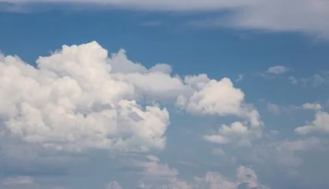 White cloud and blue sky background image. Stock Photos