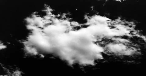 White cloud on black background. Dramatic Clouds Background. Stock Photos