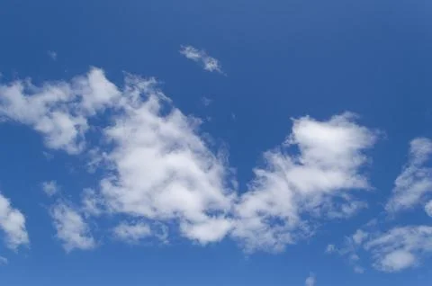 White cloud on blue sky clear background Stock Photos