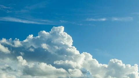 White cloud in the blue sky Stock Photos