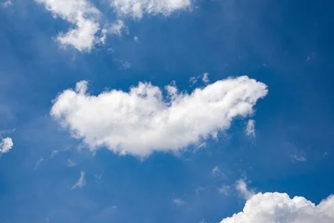 White cloud in the blue sky. Stock Photos