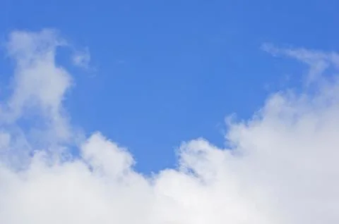 White cloud on bottom of blue sky Stock Photos