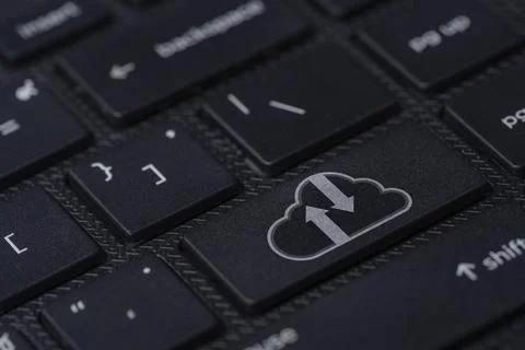 White cloud computing icon print screen on black laptop computer keyboard Foto stock