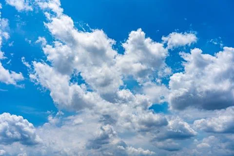 White cloud floating on the blue sky Stock Photos