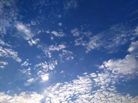 White cloud flying in blue sky Stock Photos