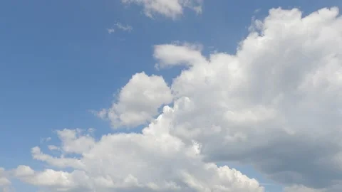 White cloud n dark gray rain storm cloudscape on blue sky Stock Footage 154342909