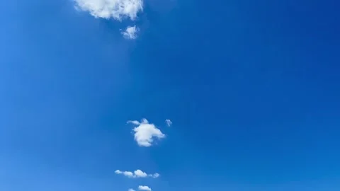 White cloud passing by in the blue sky. HD video shooting Stock Footage 155285956