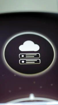 White cloud rests above two server racks Stock Photos