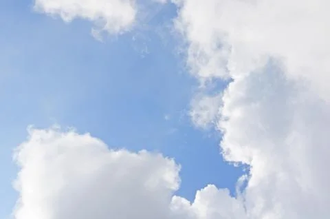 White cloud on right and bottom of blue sky Stock Photos