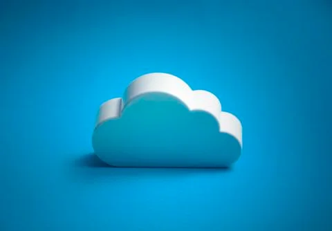 White cloud shape over blue background Stock Photos