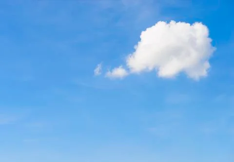 White cloud in the sky with the shape of a cartoon thinking balloon Stock Photos