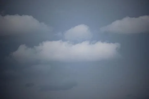White cloud texture with blue and overcast sky Stock Photos