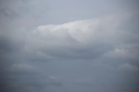 White cloud texture with blue and overcast sky Stock Photos