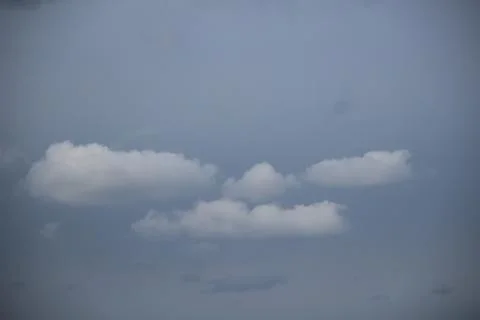White cloud texture with blue and overcast sky Stock Photos