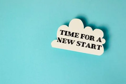 White cloud with the words Time for a new start written on it Stock Photos
