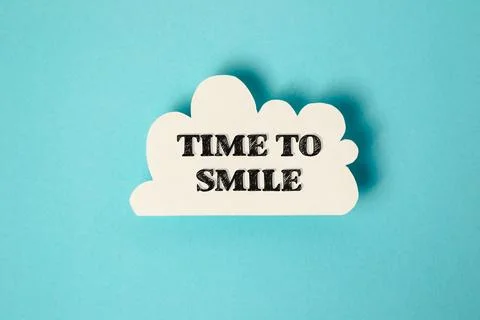 White cloud with the words "Time to smile" written in black Stock Photos