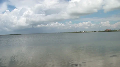 White clouds above a salt estuary in Berdiansk Stock Footage 36168012