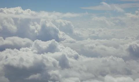 White clouds  from an aerial perspective in portrait mode perfect as a jour.. 写真素材