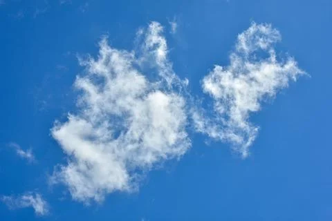 White clouds against blue sky for a backgrounds Stock Photos