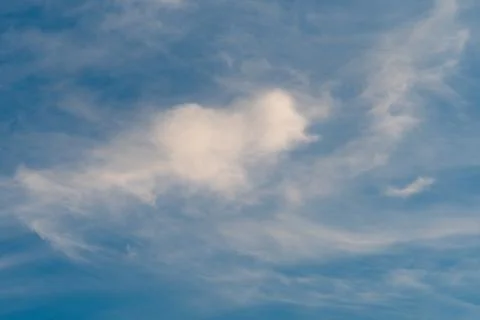 White clouds against a blue sky Stock Photos