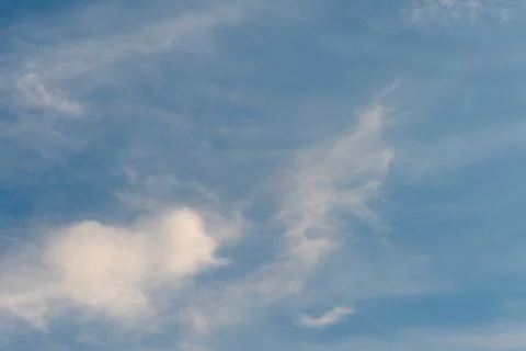 White clouds against a blue sky Stock Photos