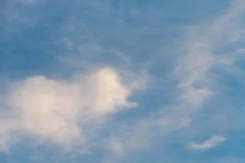 White clouds against a blue sky Stock Photos