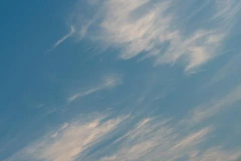 White clouds against a blue sky Stock Photos