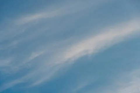White clouds against a blue sky Stock Photos
