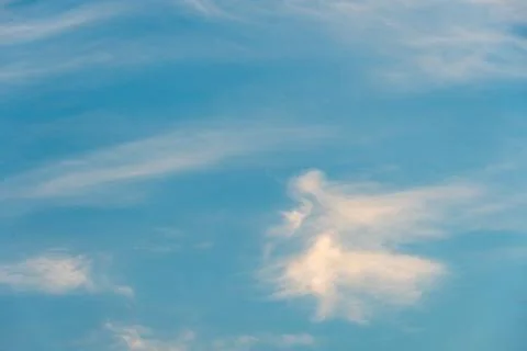 White clouds against a blue sky Stock Photos