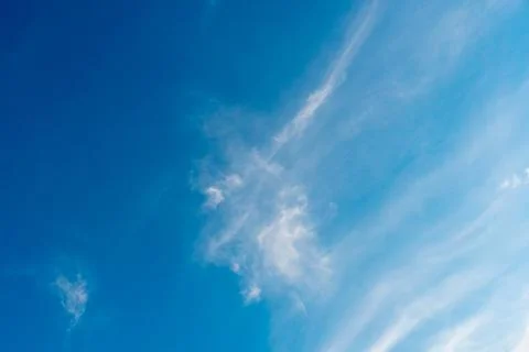 White clouds against a blue sky Stock Photos